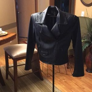 A black leather jacket size 10